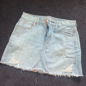 American Eagle light wash distressed mini skirt